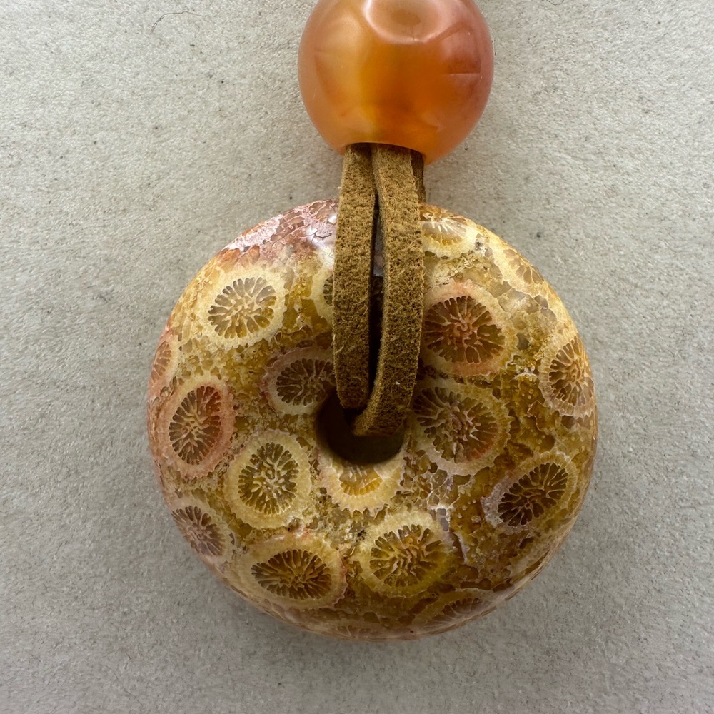 Brown and Tan Coral Fossil Donut Pendant Necklace on Brown Faux Suede - Picture 5 of 13